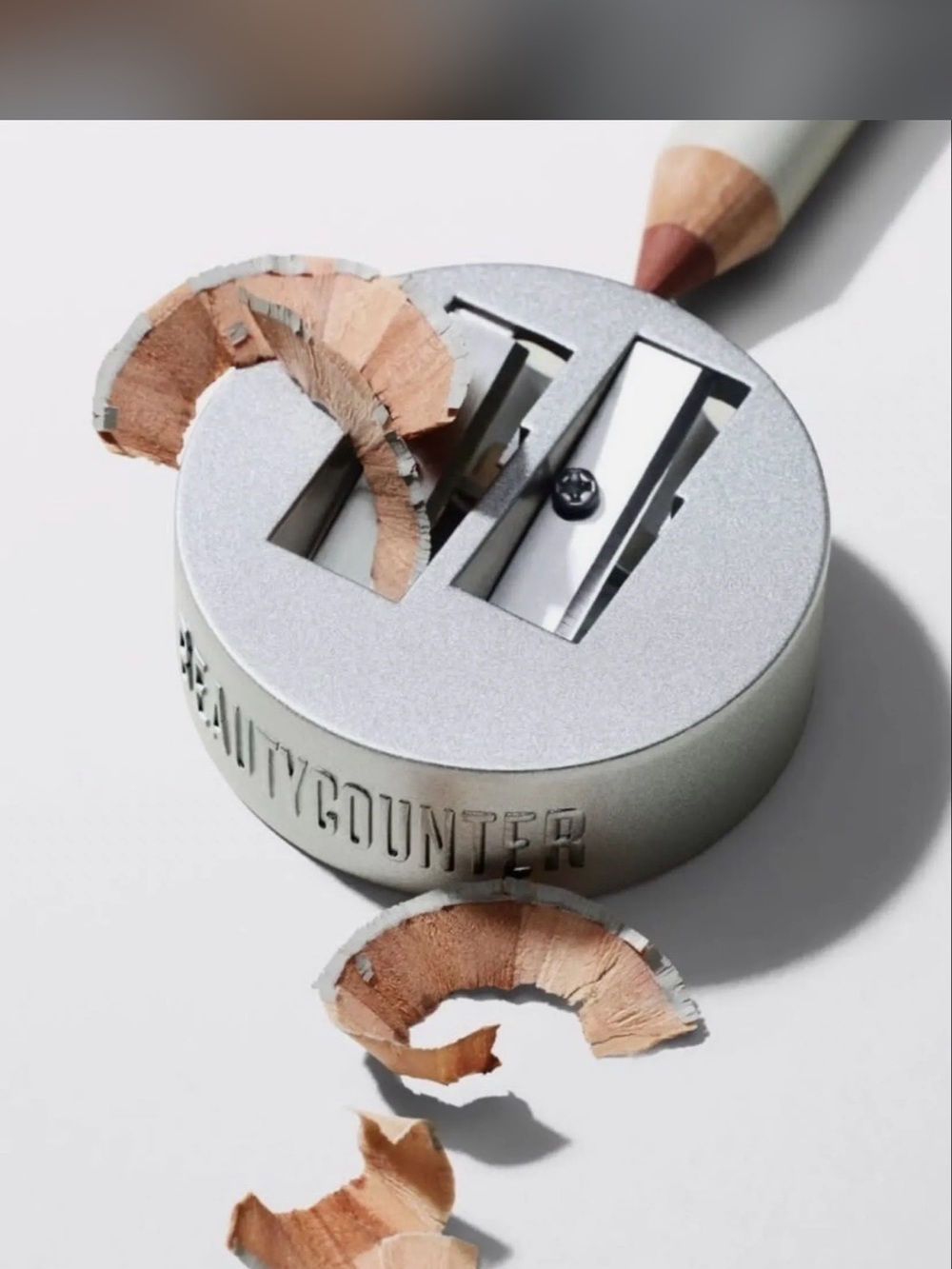 beautycounter Silver Dual Pencil Sharpener with Neutral Wood Shavings